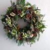 Brighten your front door with a made-to-order Christmas wreath